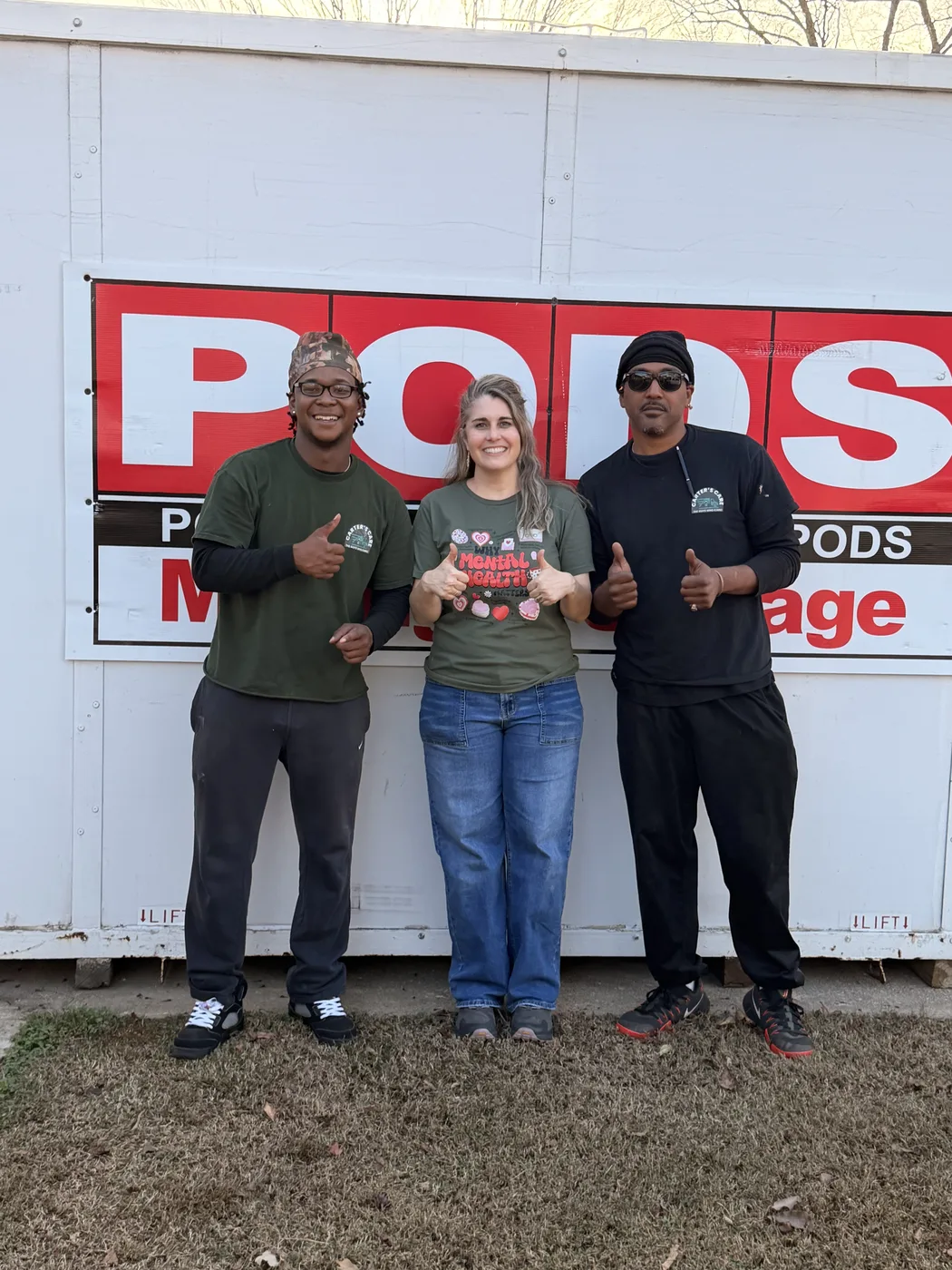 Carter's Moving crew with a customer after completing a storage facility move in Greenville, South Carolina