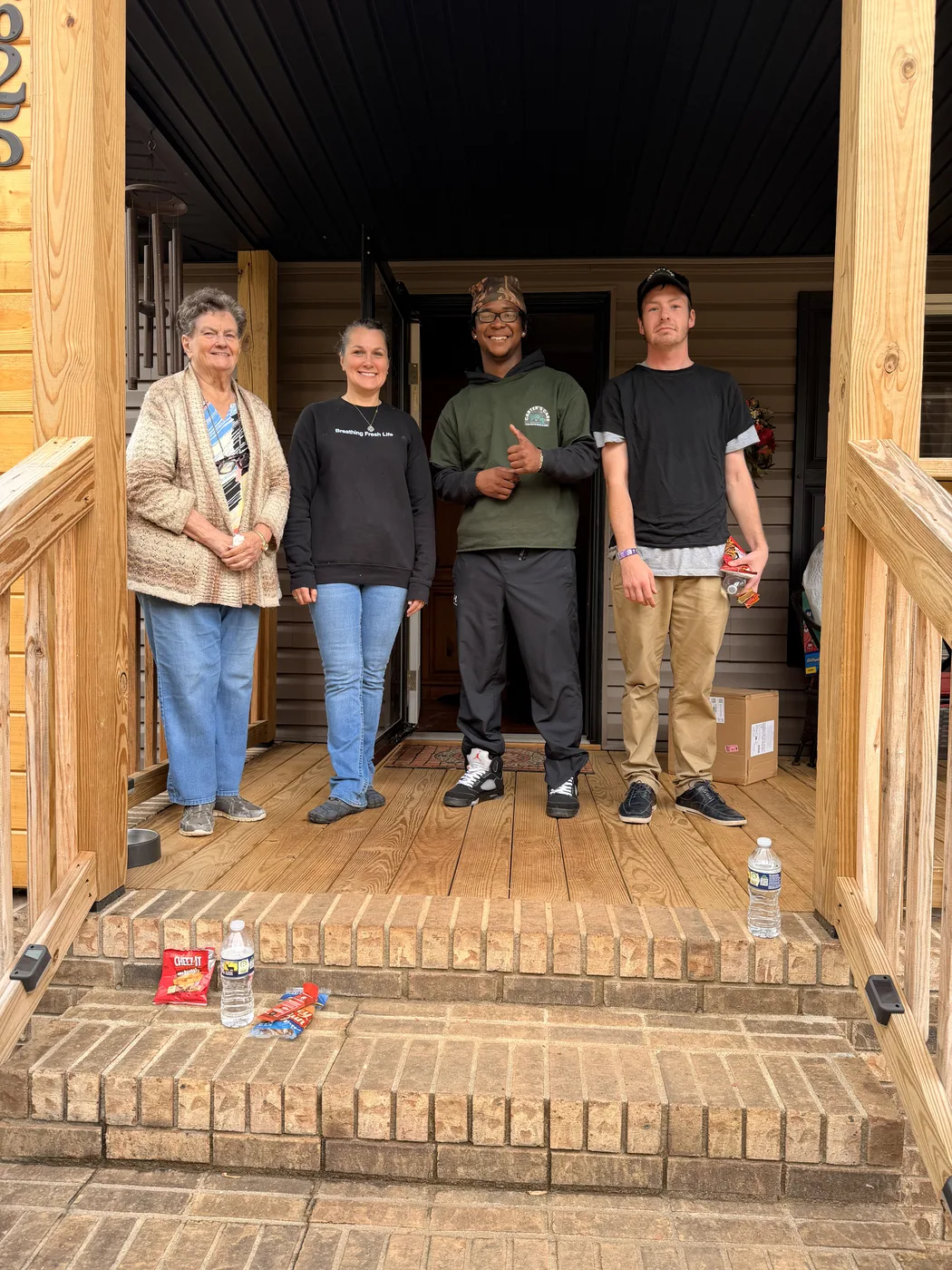 Carter's Moving team with a customer after completing a residential move in Greenville, South Carolina